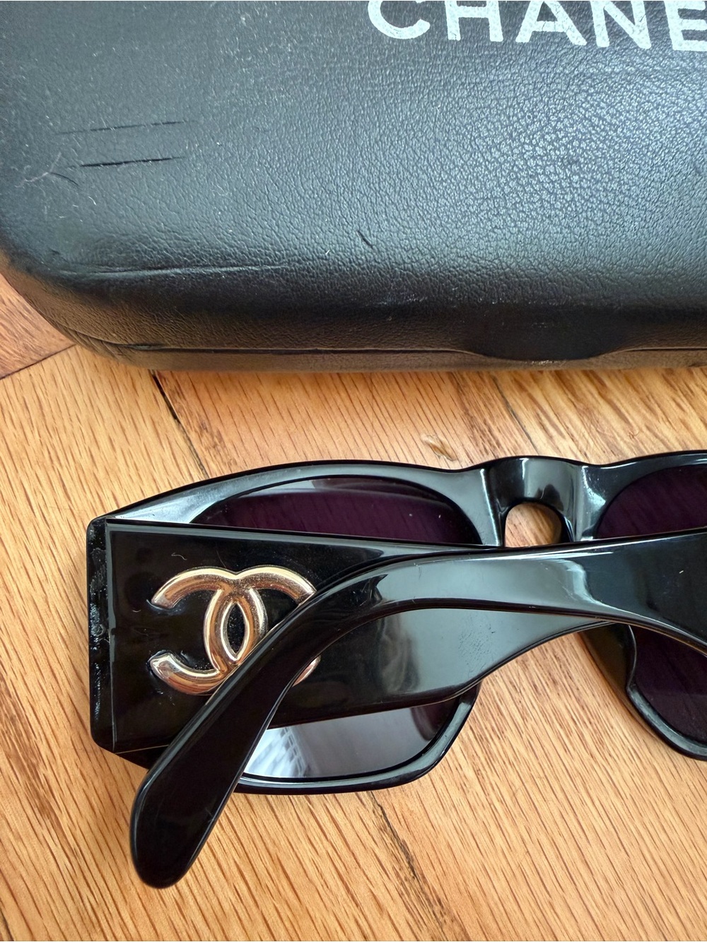 CHANEL Black Sunglasses with Gold CC Emblem
